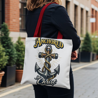 Tote bag with anchor graphic and text "Anchored in Christ"