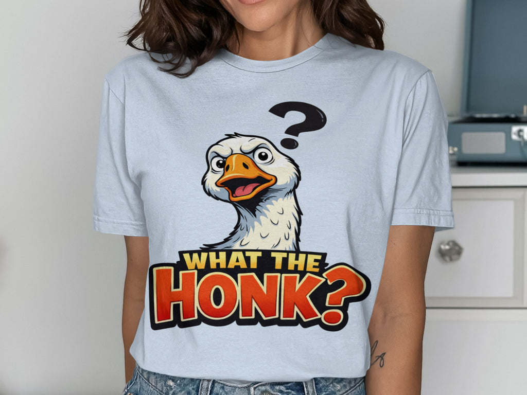 Light blue t-shirt with a startled goose and "What the Honk?" text.