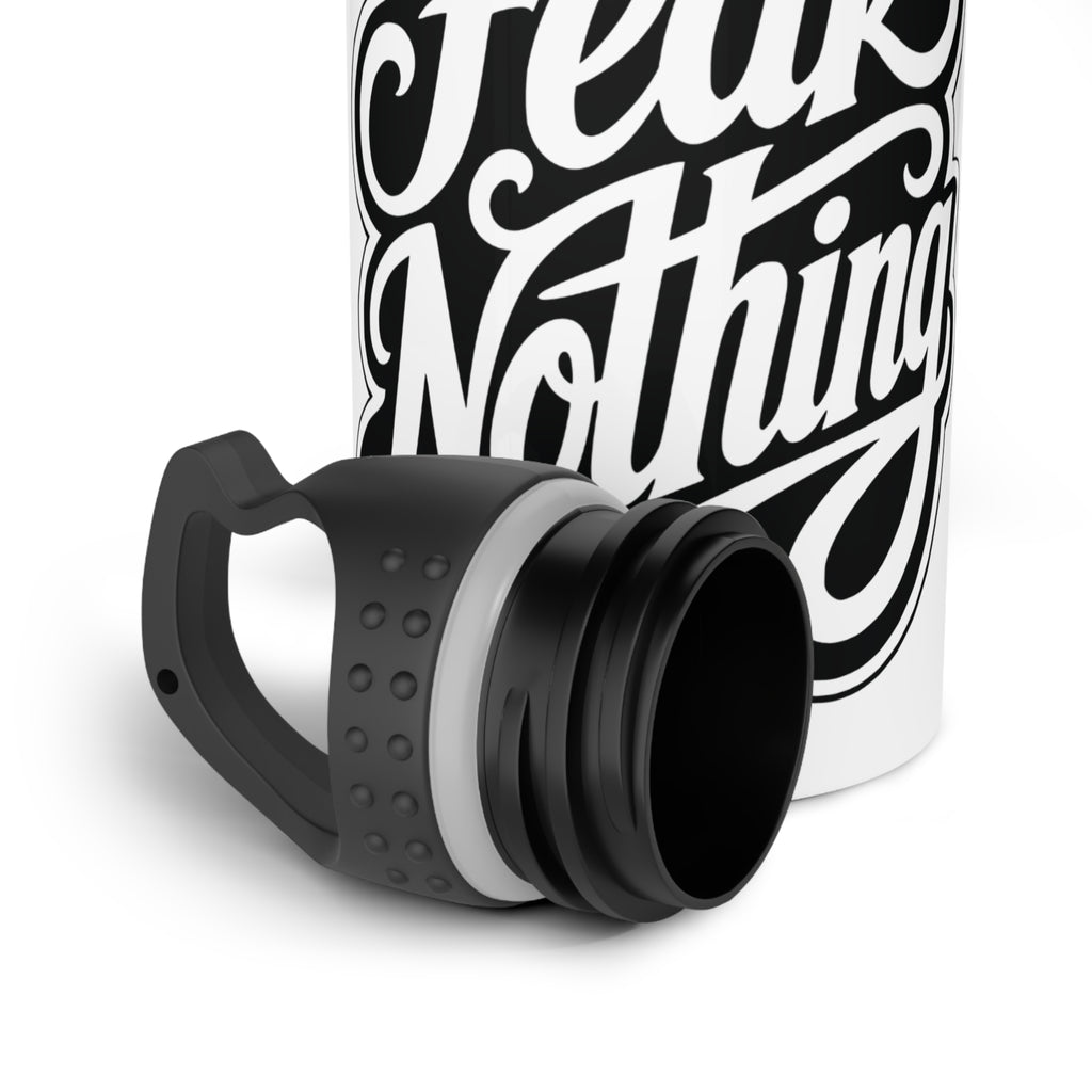White bottle with black text "Fear Nothing" and a detached black lid.