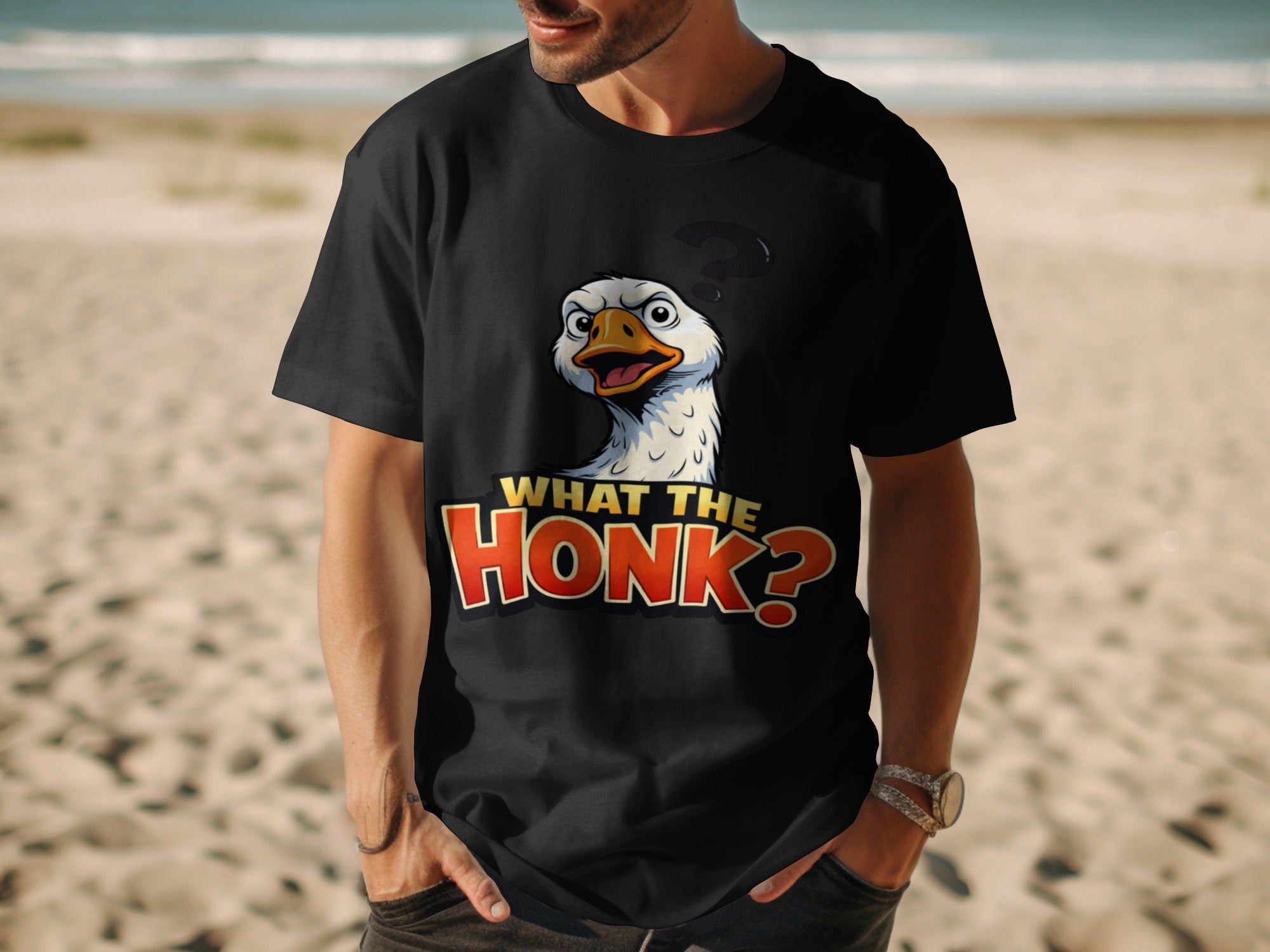Black t-shirt with a cartoon goose and "What the Honk?" text.