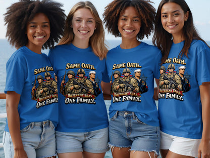 Four women wear blue t-shirts featuring military personnel with text "SAME OATH. DIFFERENT ERAS. ONE FAMILY."