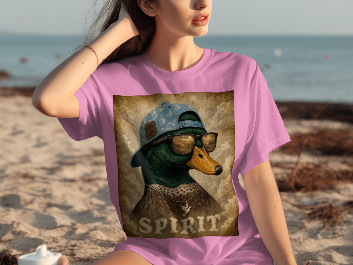 T-shirt graphic of a mallard duck wearing a baseball cap, sunglasses, and necklace, with "SPIRIT" text.