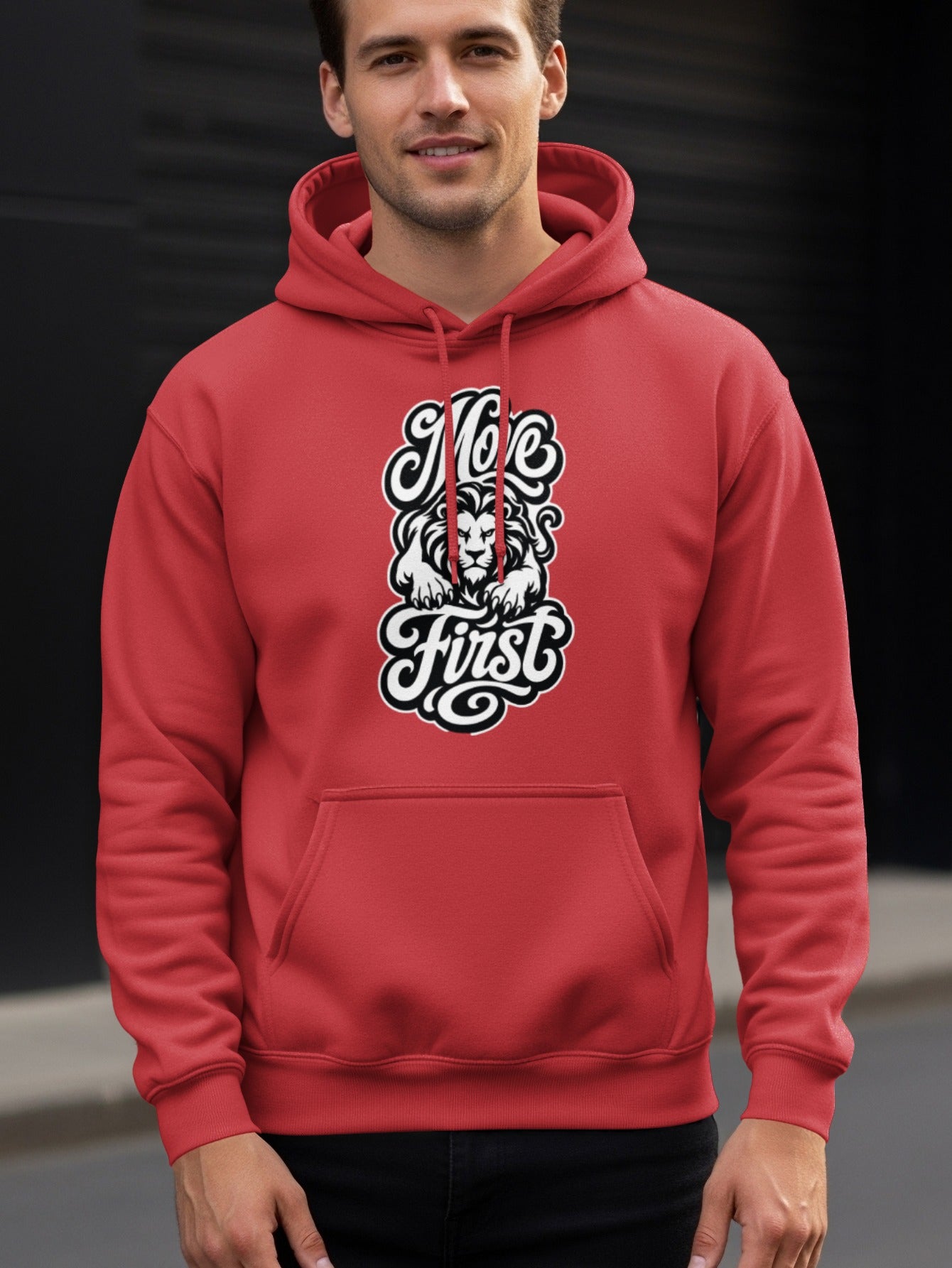 Red hoodie with white "Moe First" text and a lion graphic design.