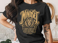 Black t-shirt with "MINDSET" and a lion, text reads "WINNERS TRAIN THEIR MINDS BEFORE THEY TRAIN BODIES."