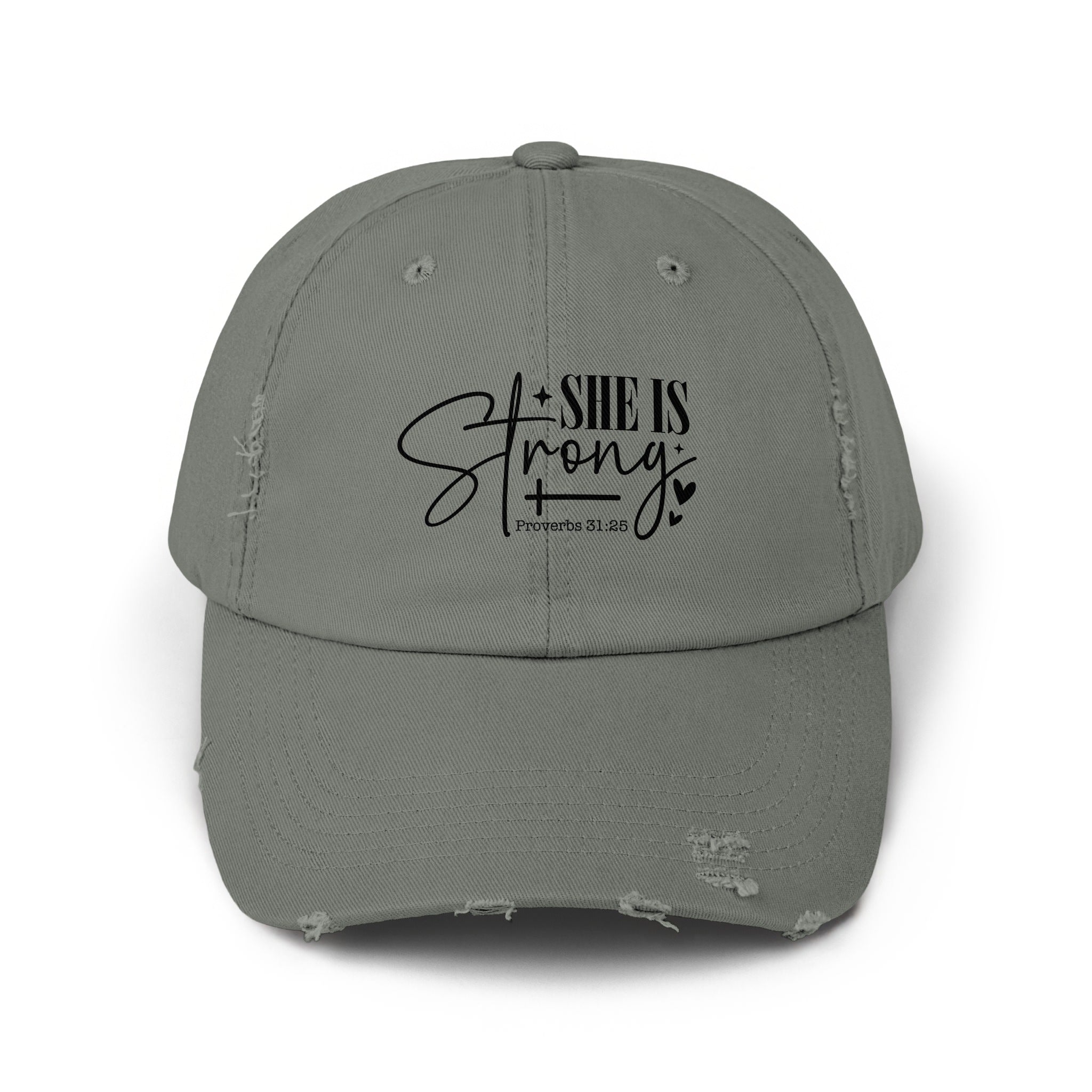 Distressed grey baseball cap with black text "SHE IS Strong" and "Proverbs 31:25".
