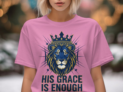 Pink t-shirt with crowned lion graphic and "His Grace Is Enough" text.