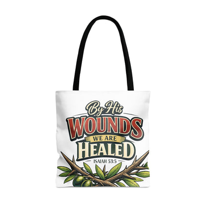 White tote bag with "By His Wounds We Are Healed Isaiah 53:5" text and olive branches.
