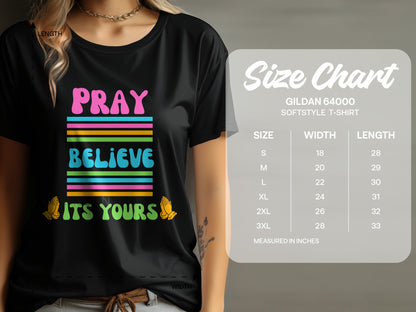 Black t-shirt with "Pray Believe Its Yours" text and size chart.