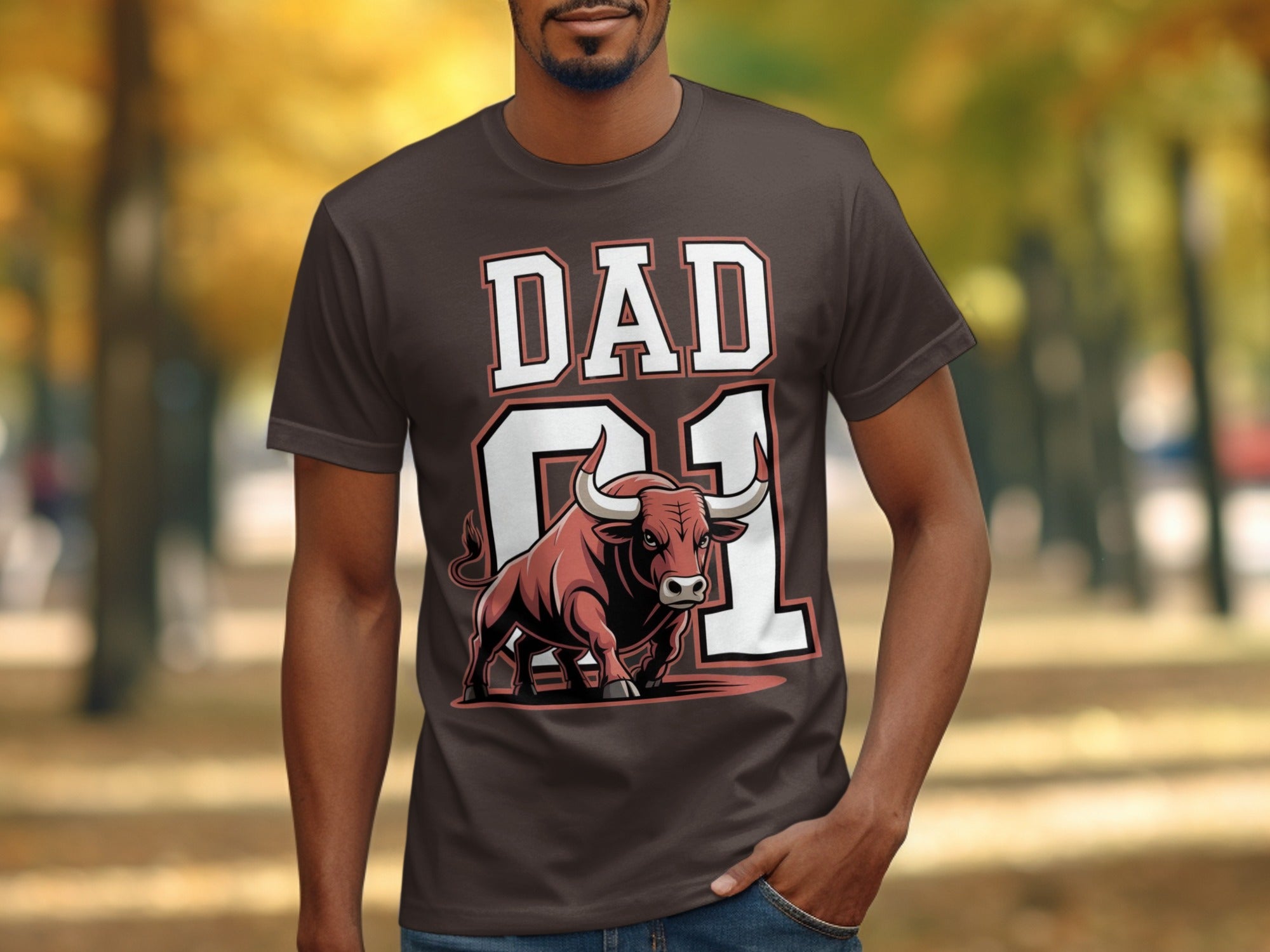 Brown t-shirt with "DAD 01" and a charging bull graphic.