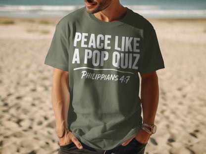 Olive green t-shirt with "Peace Like A Pop Quiz Philippians 4:7" in white text.