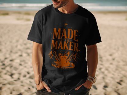 Black t-shirt with orange "MADE BY THE MAKER" text and pottery imagery.