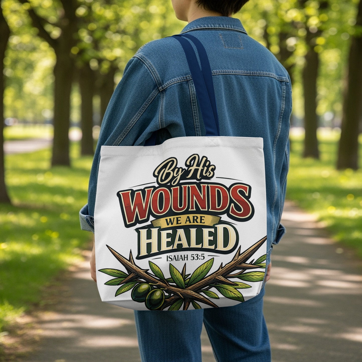 Tote bag with text "By His Wounds We Are Healed Isaiah 53:5" and olive branches.