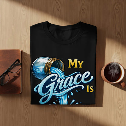 Black t-shirt with "My Grace Is" text and decorative water imagery.