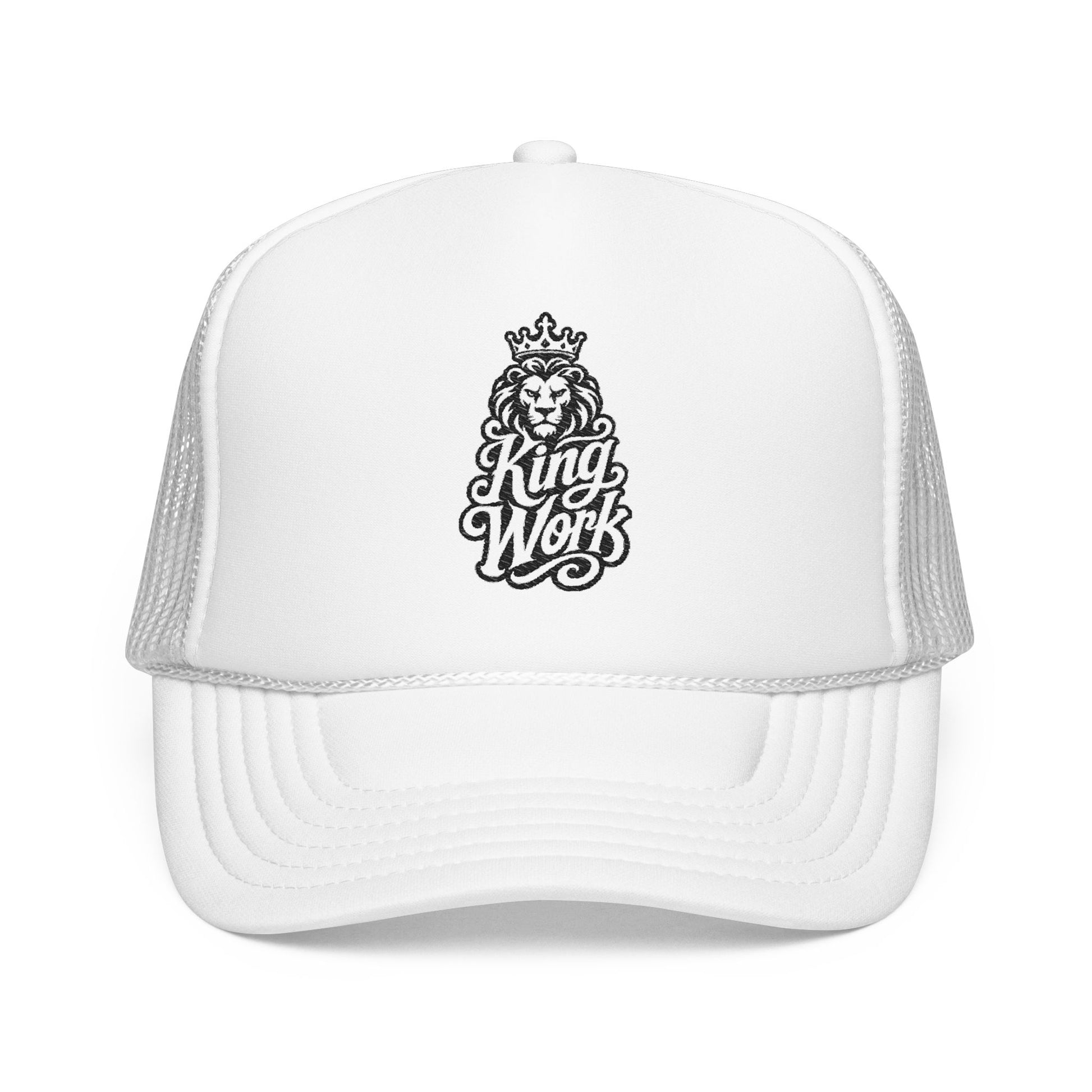 White trucker hat with a black embroidered lion wearing a crown and the words "King Work".