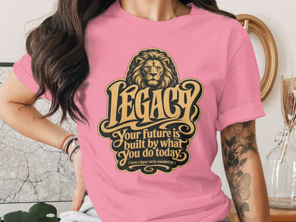 Pink t-shirt with lion and "Legacy" text, including "Your future is built by what you do today".