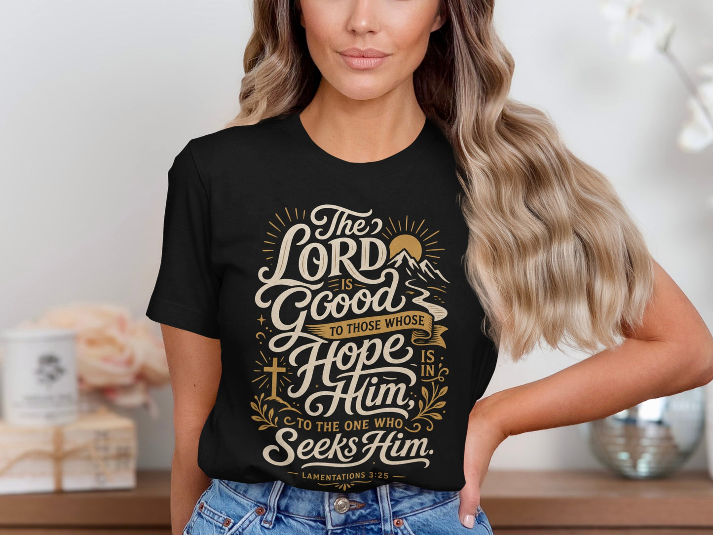 Black t-shirt with "The Lord is Good to Those Whose Hope is in Him. To the one who seeks Him. Lamentations 3:25".