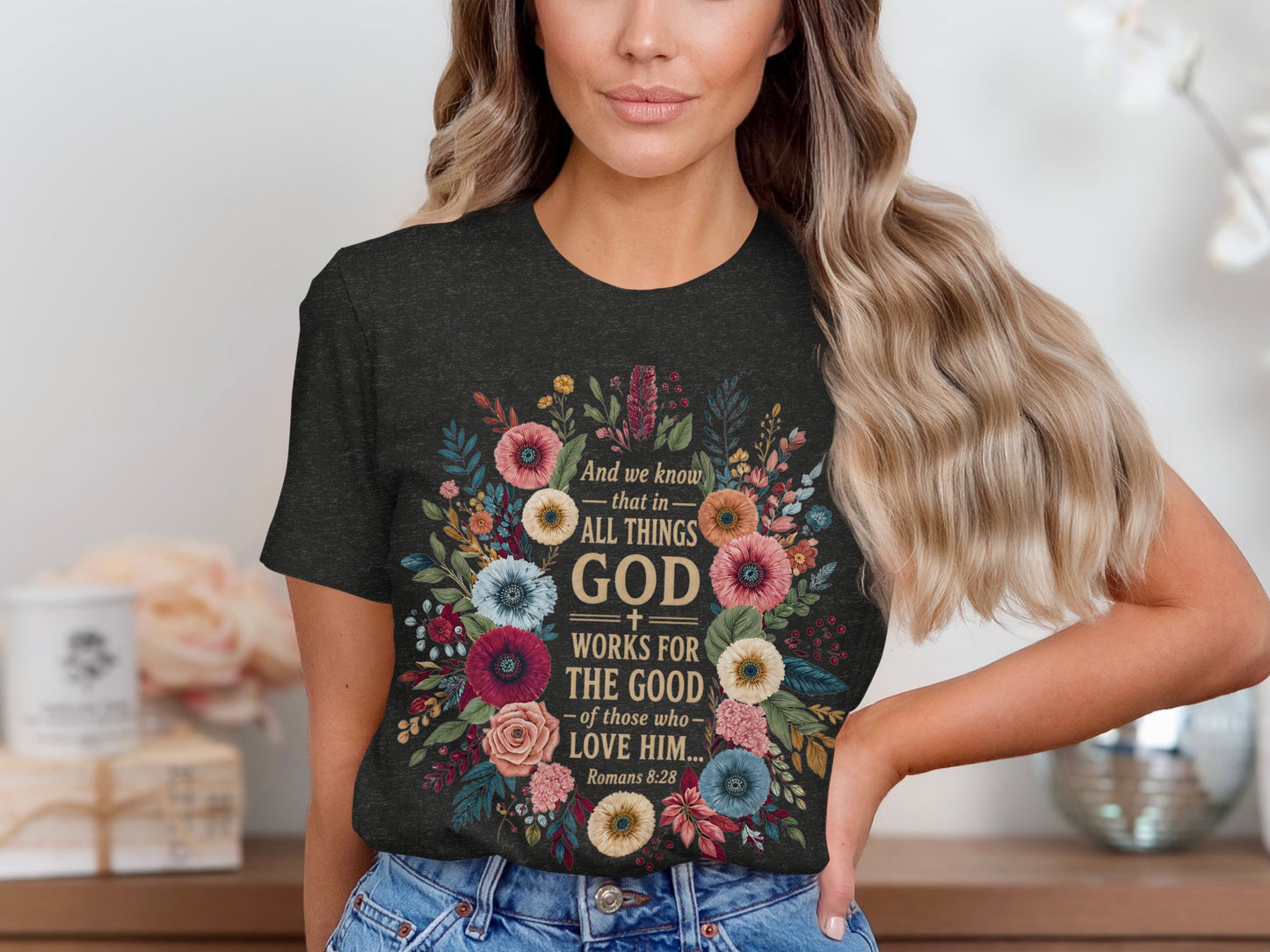 Dark grey t-shirt with floral design and text "God Works For The Good".