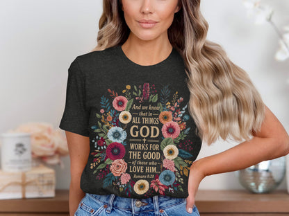 Dark grey t-shirt with floral design and text "God Works For The Good".