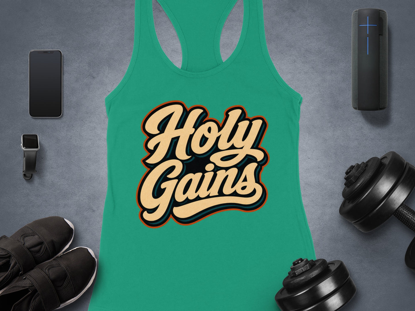 Green tank top with "Holy Gains" text, dumbbells, speaker, phone, and watch.