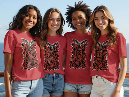 Four women wear matching red shirts with eagle graphic and "We will rise on wings like eagles" text.