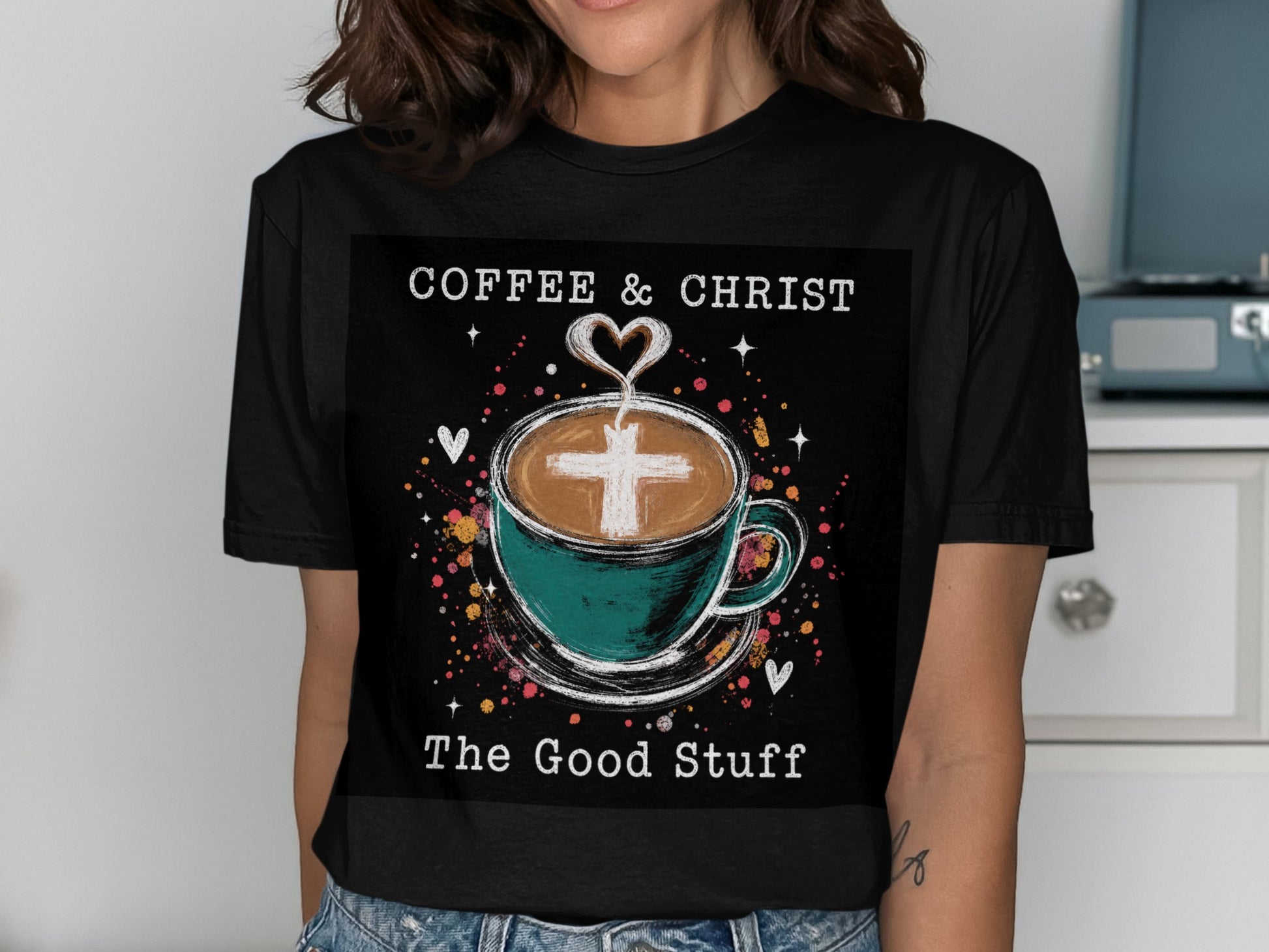 T-shirt graphic: coffee cup with cross in foam, text "Coffee & Christ The Good Stuff."