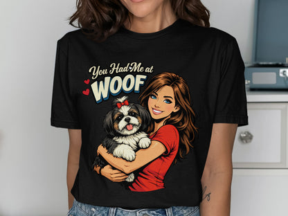 Black t-shirt with graphic of woman holding a dog, text "You Had Me at WOOF".