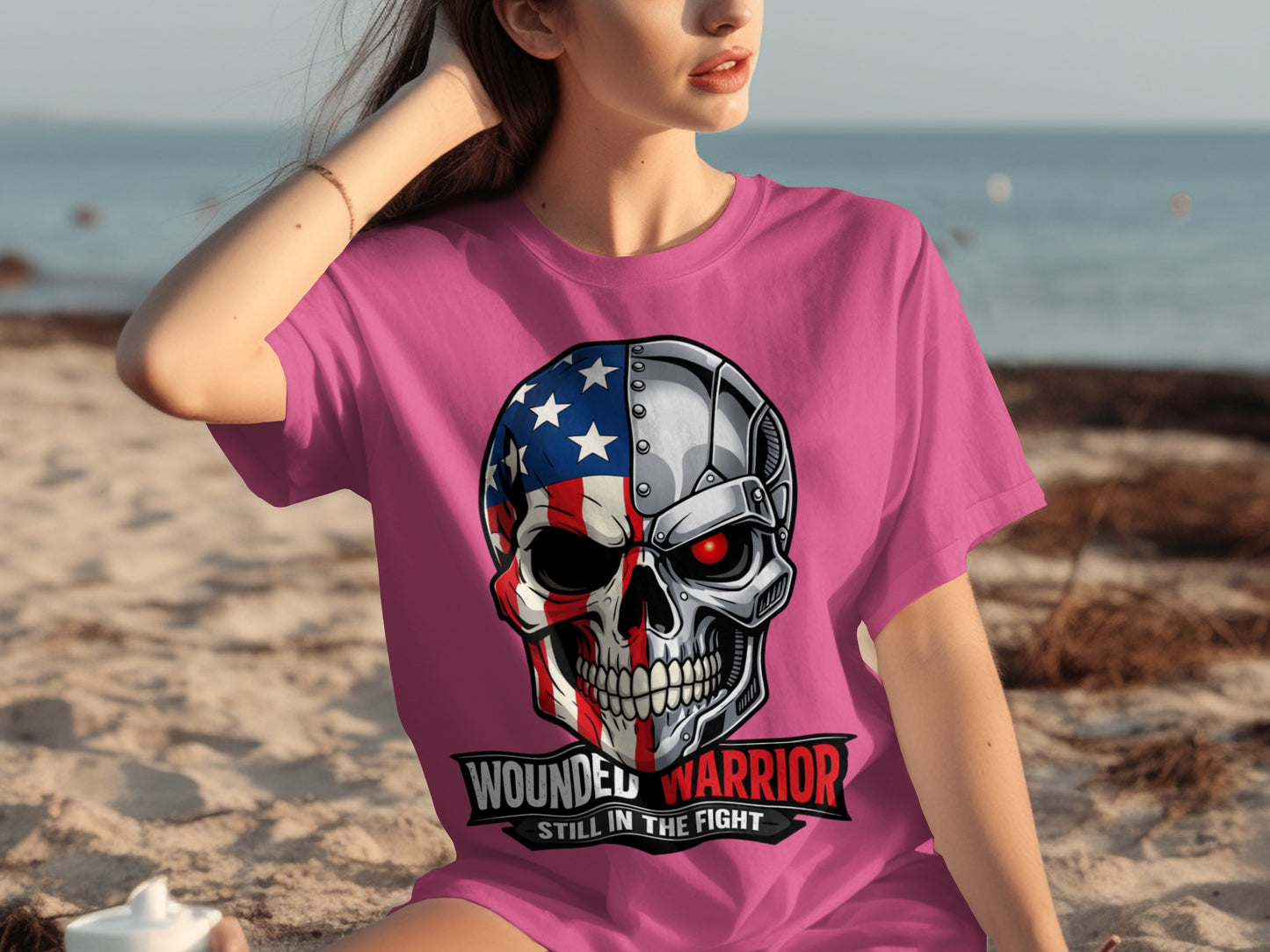 Pink t-shirt with a graphic of a skull, half American flag, half metallic with a red eye