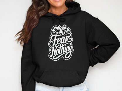 Black hoodie with white graphic text "Fear Nothing" and wolf's head.