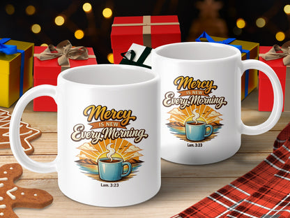 Two white mugs foregrounded with "Mercy Is New Every Morning" text and Lam. 3:23 caption.