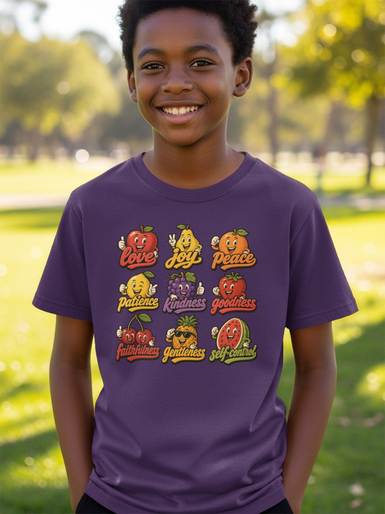 T-shirt with cartoon fruits representing virtues: love, joy, peace, patience, kindness, goodness, faithfulness, gentleness, self-control.