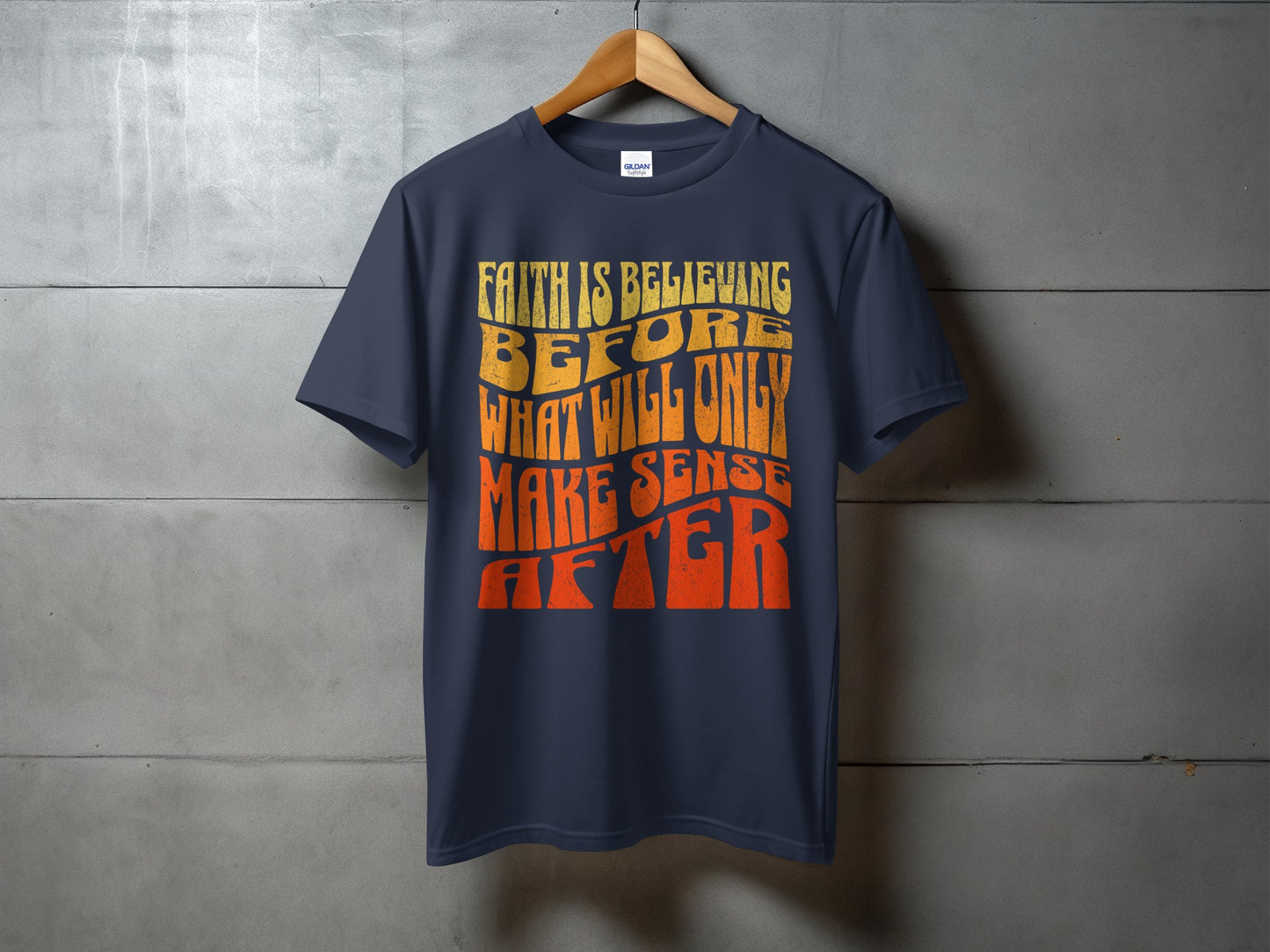 Navy t-shirt with retro text that reads "Faith is believing before what will only make sense after."