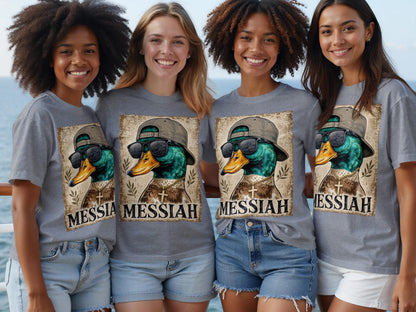 Four women in gray t-shirts with a duck graphic and the word MESSIAH.