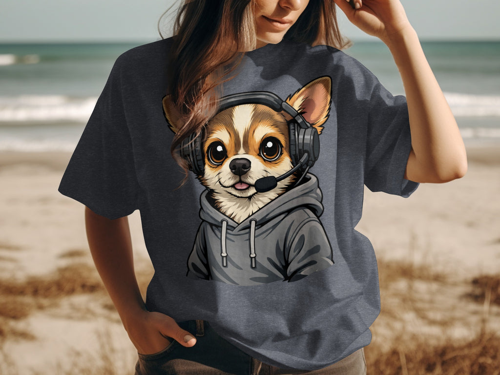 Chihuahua wearing headphones and hoodie on a t-shirt, beach background.