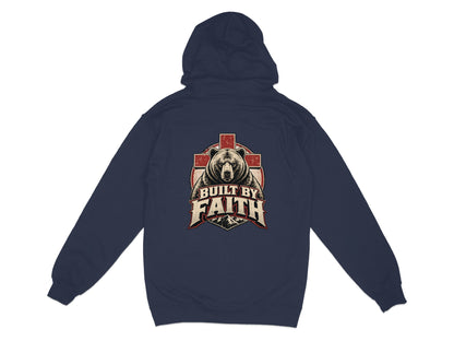 Navy hoodie with a distressed graphic of a bear, cross, and mountains with text "BUILT BY FAITH".