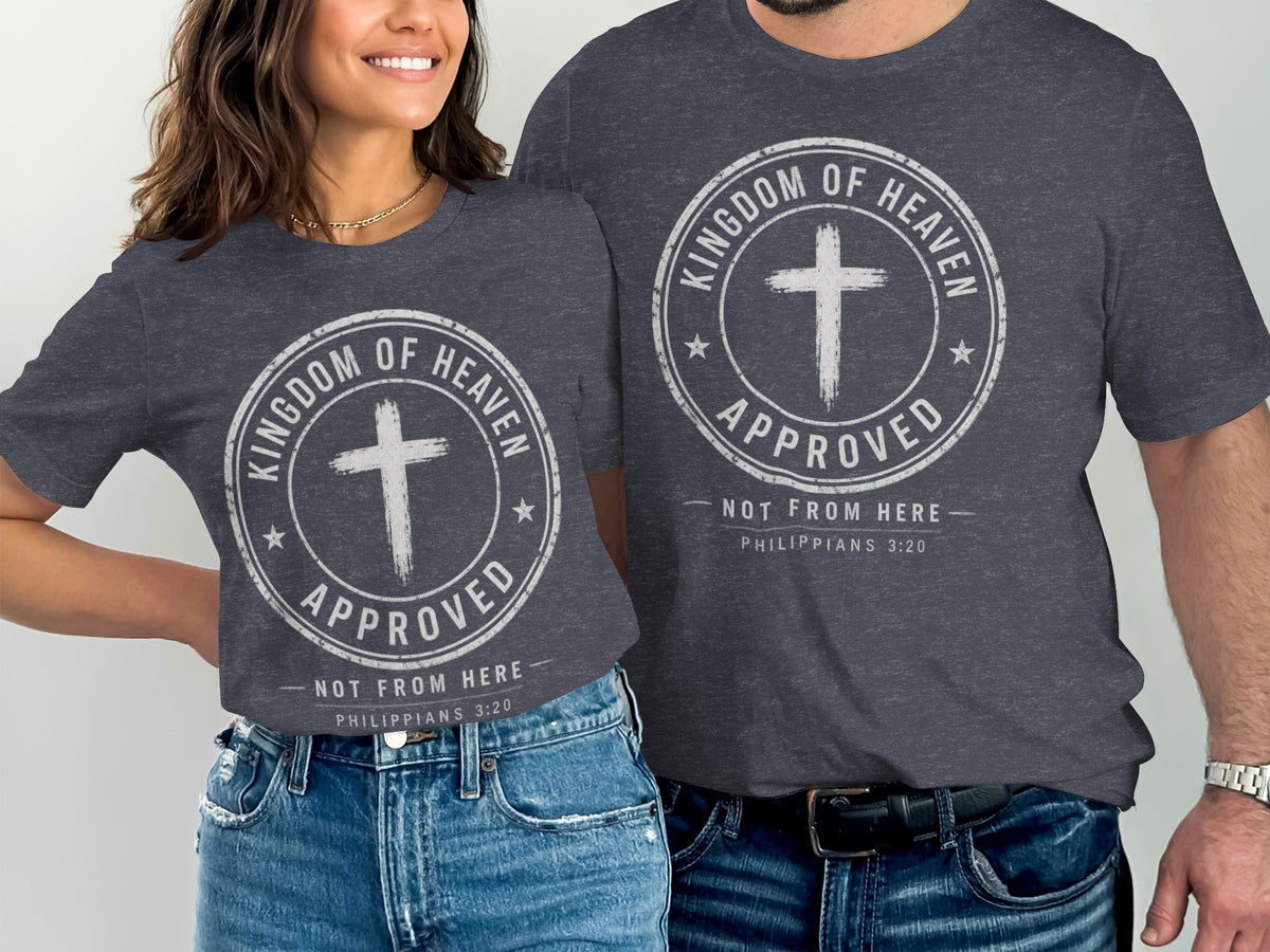 Dark grey t-shirts with a distressed circular graphic featuring a cross, "Kingdom of Heaven Approved," and "Philippians 3:20."