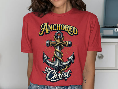 Red t-shirt with "Anchored in Christ" text and an anchor graphic.