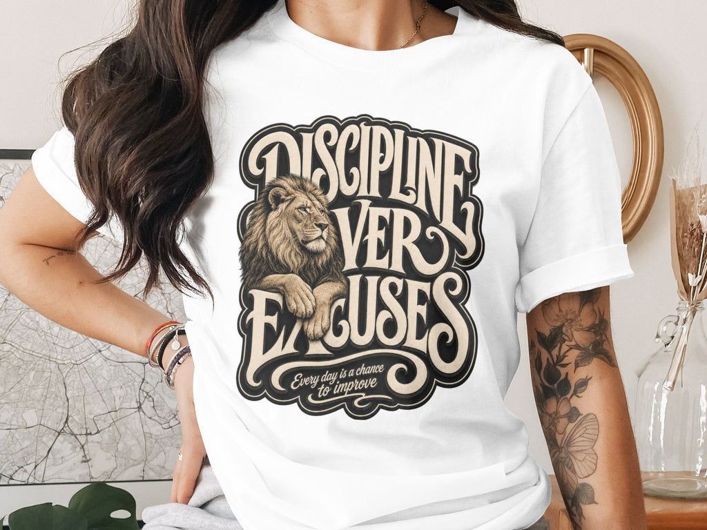 White t-shirt with "DISCIPLINE VER EXCUSES" text and a lion graphic.