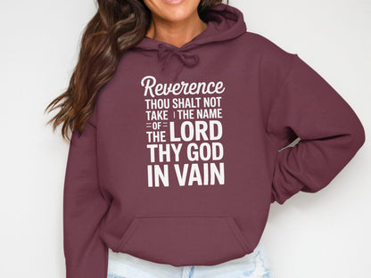 Maroon hoodie with white text reading "Reverence thou shalt not take the name of the Lord thy God in vain."