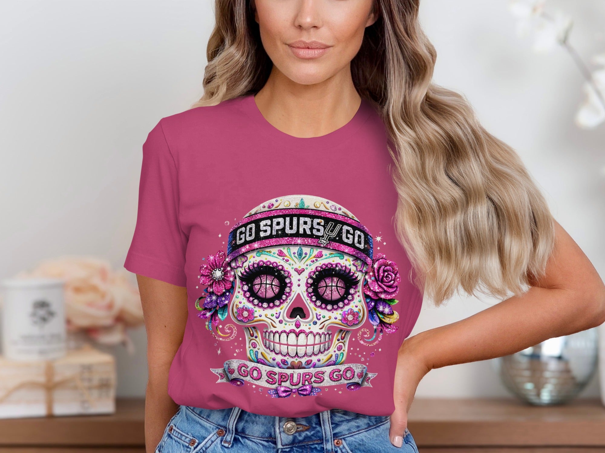 Pink t-shirt with glittery sugar skull graphic saying "GO SPURS GO".