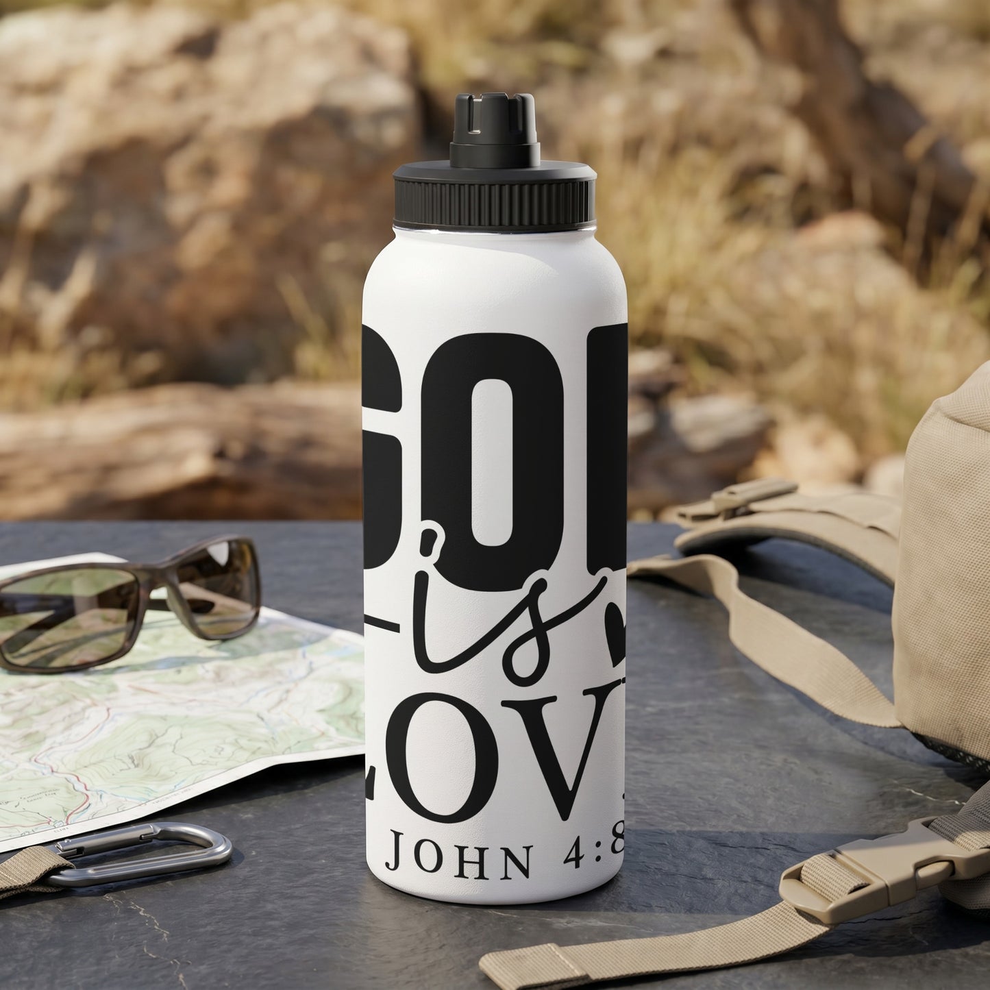White water bottle with black text "God is Love John 4:8".