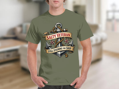 Olive green t-shirt with an anchor design and "Salty Veteran Still Steering The Ship".