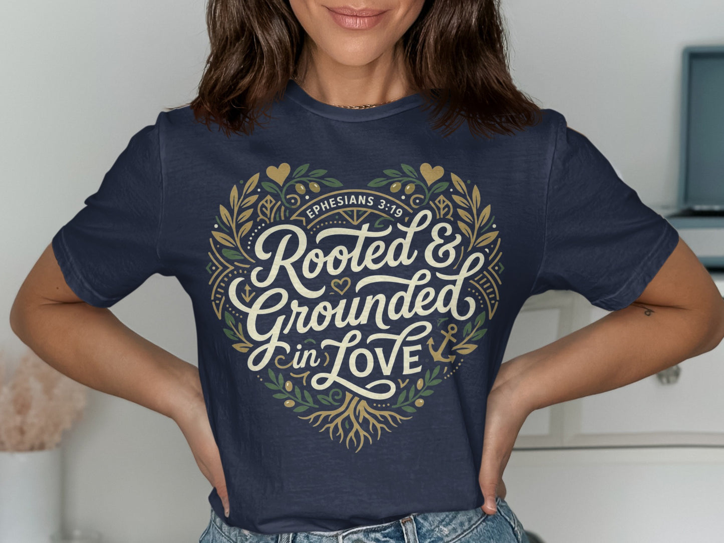 Navy t-shirt with heart design and text "Rooted & Grounded in Love".