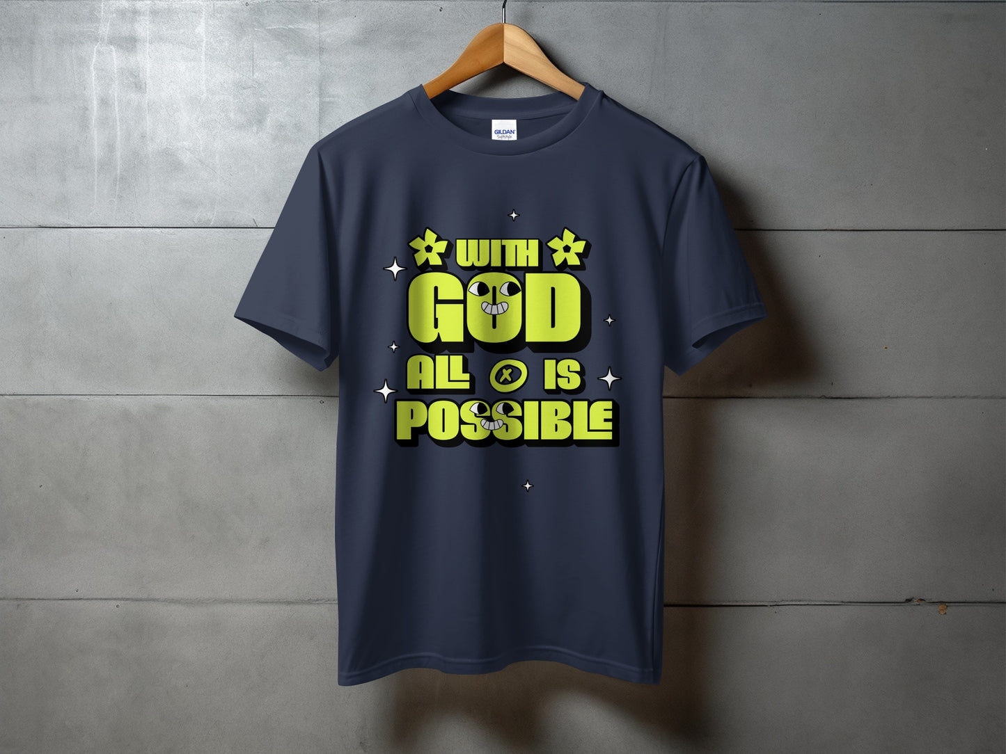 Dark blue t-shirt with green text and a cartoon face that says "WITH GOD ALL IS POSSIBLE".