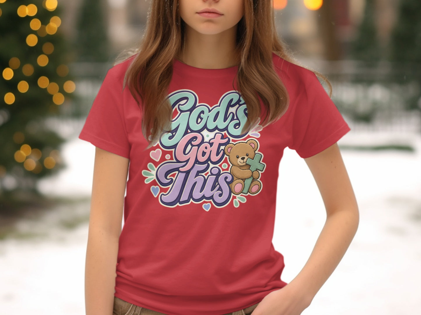 Red t-shirt with "God's Got This" text and a teddy bear holding a cross.