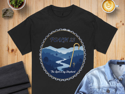 Black t-shirt with "Psalm 23 The Lord is my Shepherd" graphic and landscape scene.