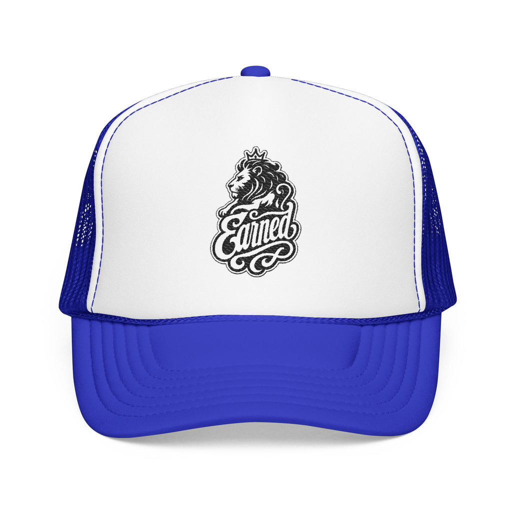 Blue trucker hat with white front and a lion graphic with the word "Earned".