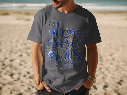 Grey t-shirt with blue floral design and "Love Never Fails" text.