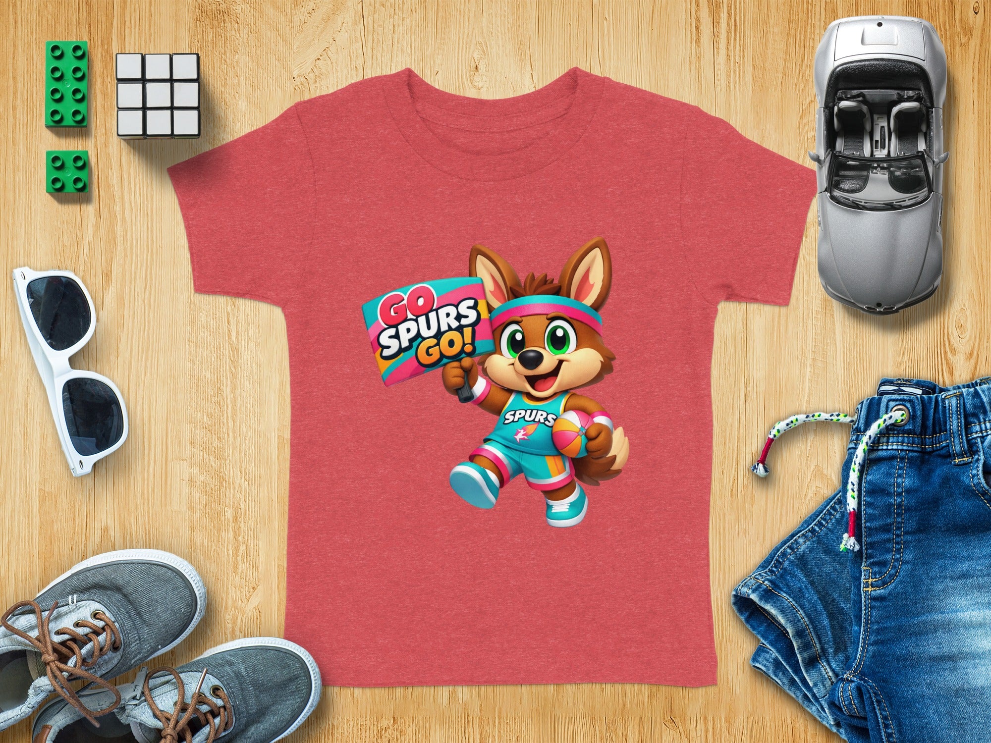 Red t-shirt featuring cartoon fox mascot holding "Go Spurs Go!" sign.