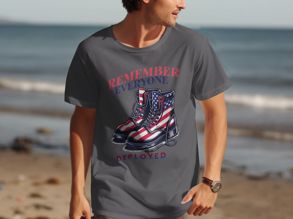 Graphic t-shirt with boots printed in American flag colors and text "Remember Everyone Deployed."