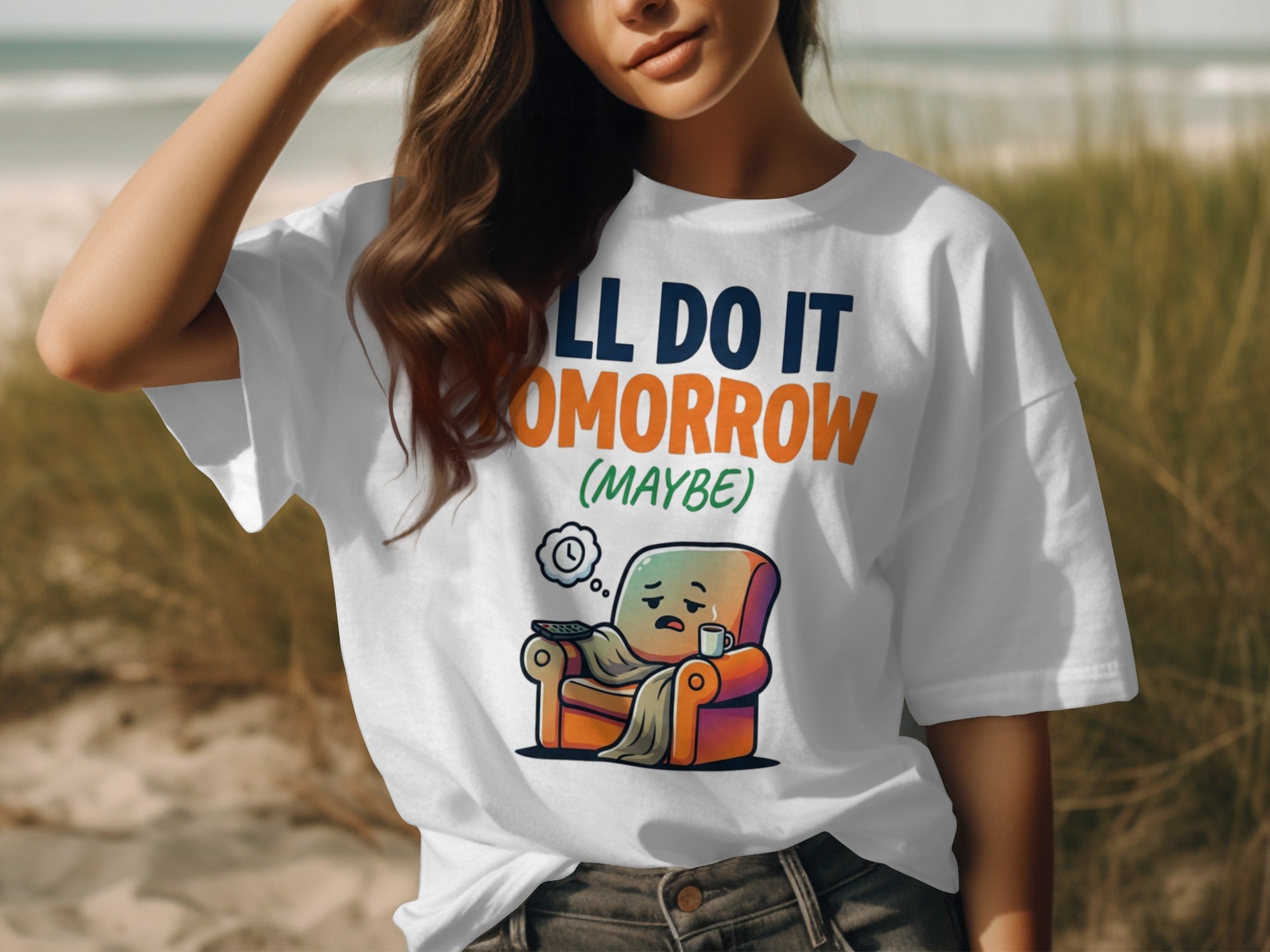 White t-shirt with "I'LL DO IT TOMORROW (MAYBE)" text and cartoon recliner.